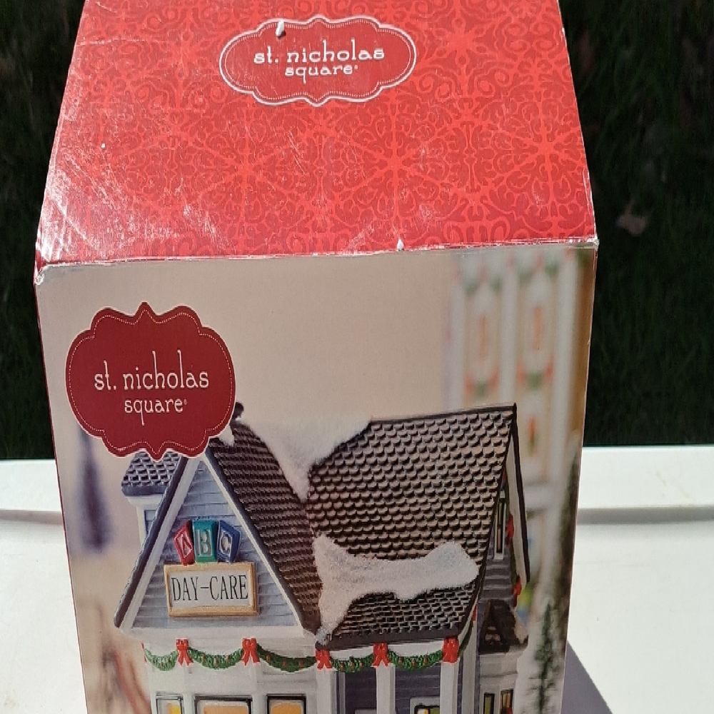 St. Nicholas Square Red and White Holiday Day-Care Village House